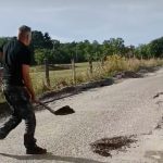 Amnasenii au acoperit craterele de pe drum